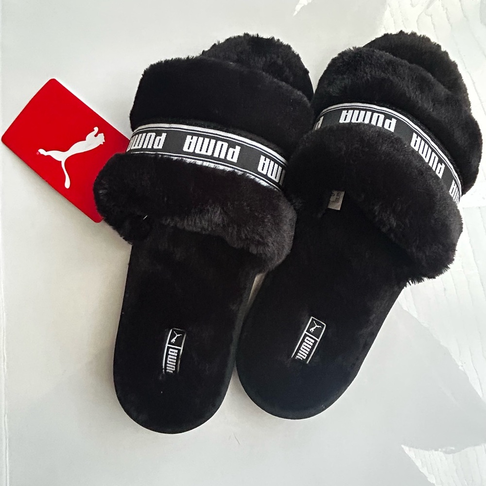 Puma Slippers.